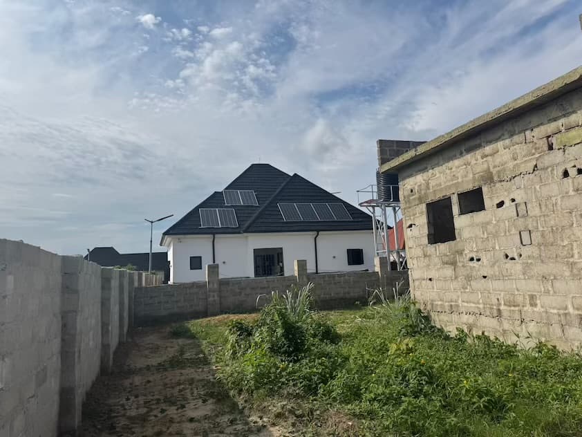 Completed bungalow with rooftop solar installation at Joe's Villa